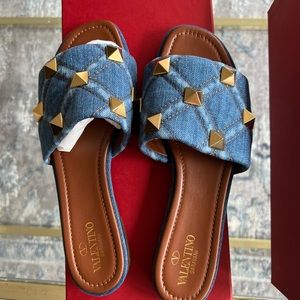 Brand new, never worn Valentino denim large rock stud sandal.